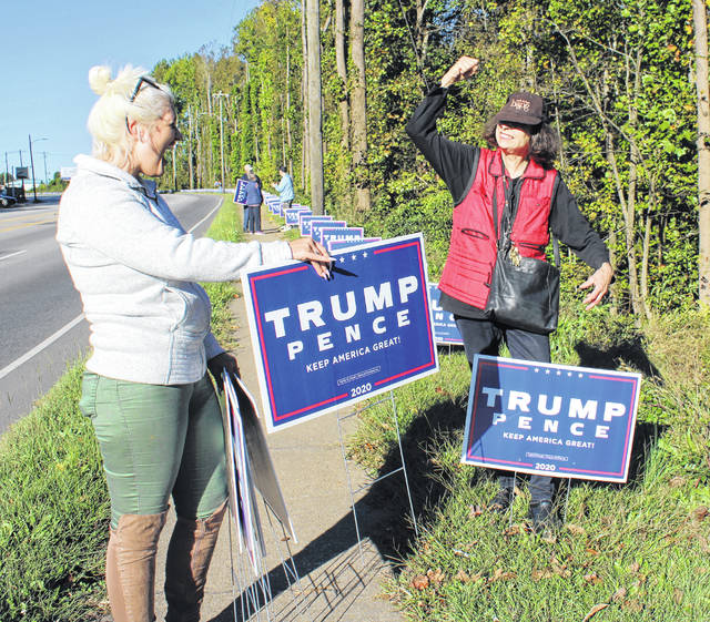 
			
				                                Sandra Horton, 71, continues to place her Donald Trump signs even after they are destroyed. Supporters helped her put out about 300 signs on Oct. 30. 
                                 Liz O’Connell | Anson Record

			
		