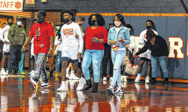 
			
				                                Family members escort their senior player during Anson High School’s senior night on Jan. 29. Seniors were recognized for their efforts and contributions as a Bearcat.
                                 Contributed Photo

			
		