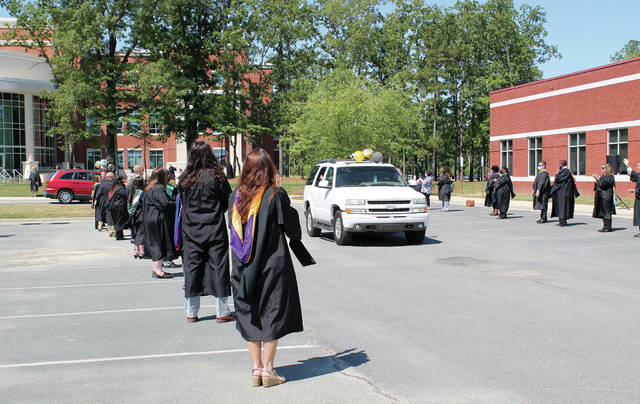 
			
				                                Nearly 140 South Piedmont Community College graduates participate in the drive-thru style graduation ceremony on May 15. There was a total of 271 SPCC 2021 graduates.
                                 Contributed Photo

			
		