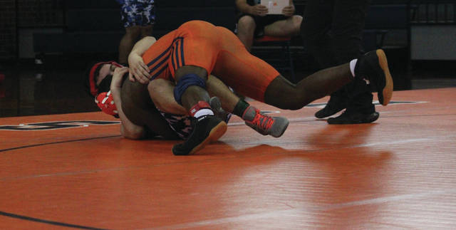
			
				                                Dakwan Cash pins down his opponent during Anson’s home opener on April 27.
                                 Liz O’Connell | Anson Record

			
		