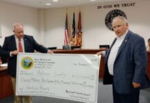 
			
				                                County Attorney Scott Forbes and Representative Mark Brody proudly posed with the $11,150,000 check made out to Anson County.
                                 Lauren Monica | Anson Record 

			
		