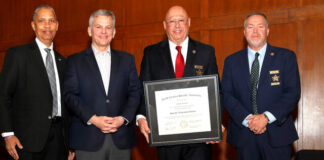 
			
				                                Pictured from left to right are Secretary of Department of Public Safety Eddie Buffaloe Jr, Attorney General Josh Stein, Sheriff Scott Howell, and Sheriff Darren Campbell President of The North Carolina Sheriff’s Association.
 
			
		